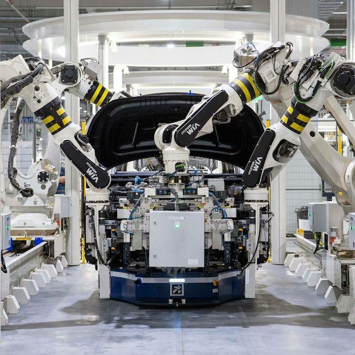 Robots constructing car
