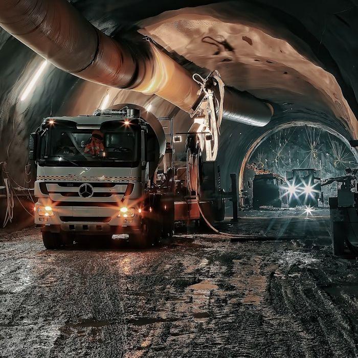 Truck driving in underground tunnel